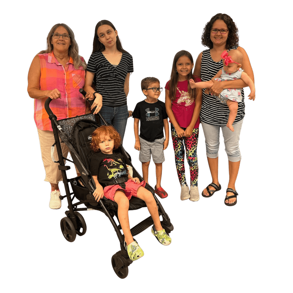 A family featuring a grandmother, mother and 5 children, one of whom receives help from the Tampa Lighthouse.